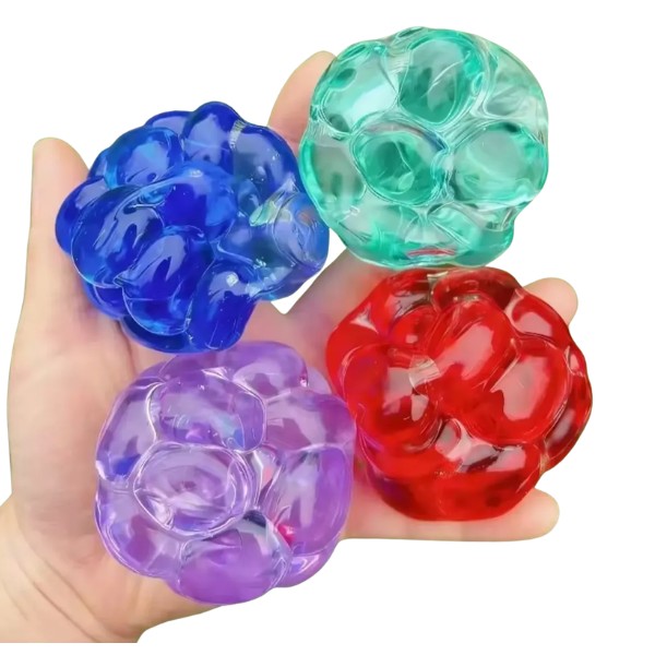 Pelota Squishy Antiestrés Con Piedras Sonoras Sensorial